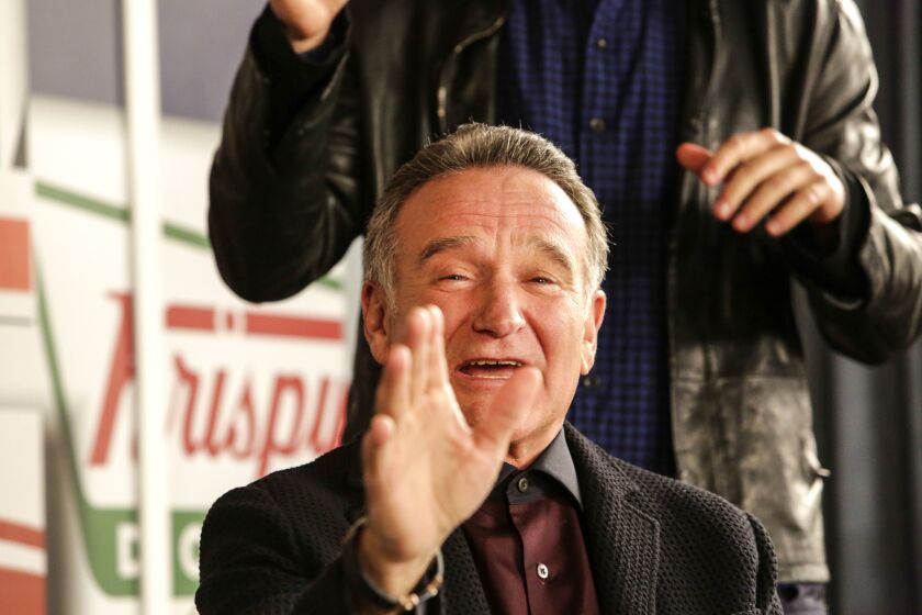 Robin Williams on the set of his most recent TV series, "The Crazy Ones," last November.
