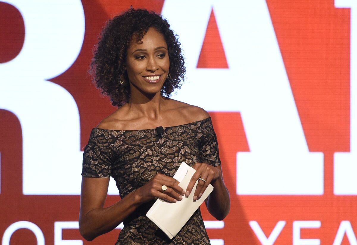 FILE - In this July 11, 2017, file photo, Sage Steele speaks at the 15th annual High School Athlete of the Year Awards in Marina del Rey, Calif. Steele will not appear on ESPN's “SportsCenter” the remainder of this week and has been pulled from moderating an upcoming network event following comments she made on a recent podcast. Steele appeared on a podcast hosted by former NFL quarterback Jay Cutler where she criticized ESPN and the Walt Disney Company's mandate for employees to receive the coronavirus vaccine. (AP Photo/Chris Pizzello, File)