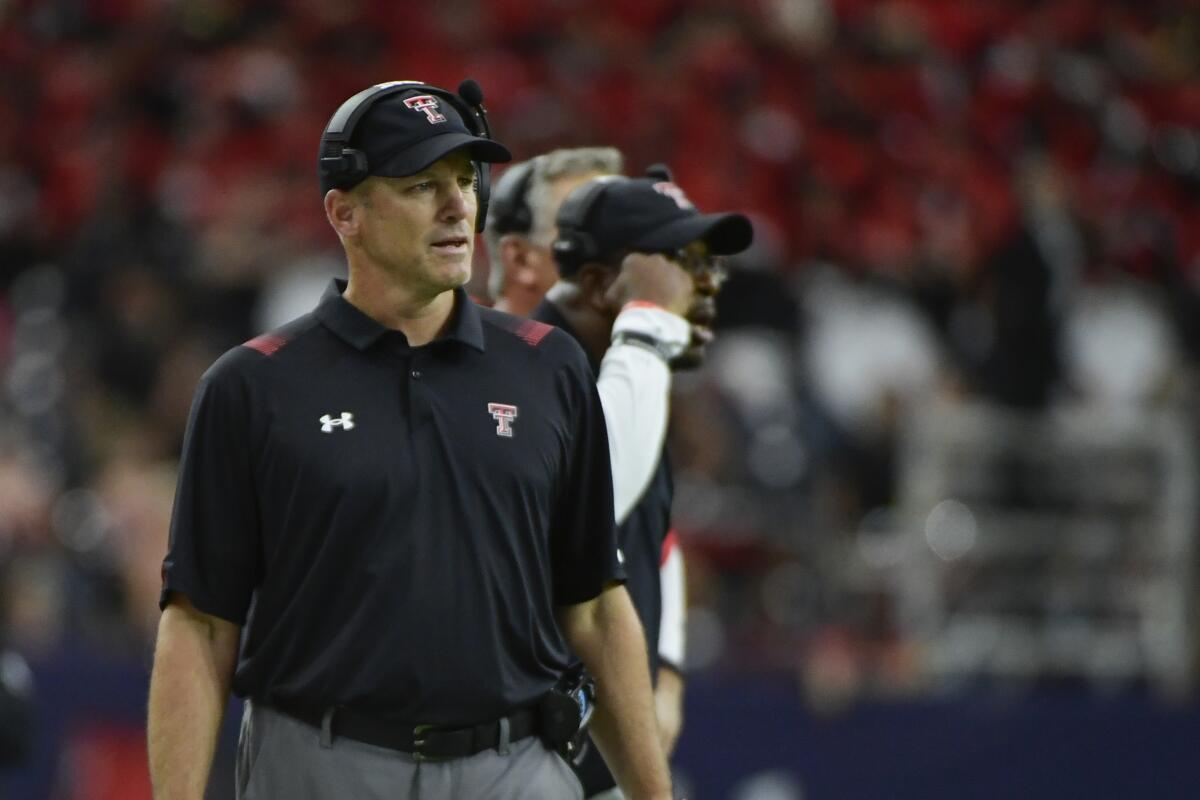 Texas Tech head coach Matt Wells watches from the sidelines as his team plays Houston during the first half of an NCAA college football game Saturday, Sept. 4, 2021, in Houston. (AP Photo/Justin Rex)