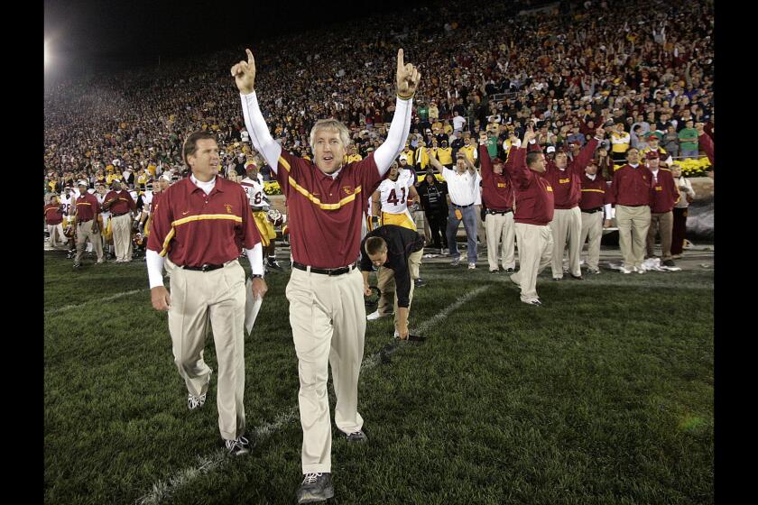 Coach Pete Carroll reacts after USC beat Notre Dame, 34–31, on Oct. 15, 2005, at South Bend, Ind.