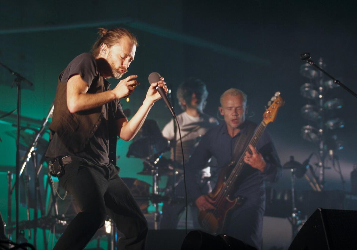 Atoms for Peace with Thom Yorke, left, and Flea onstage earlier this month in Austin, Texas. Yorke played a surprise DJ set at a UK festival this weekend.