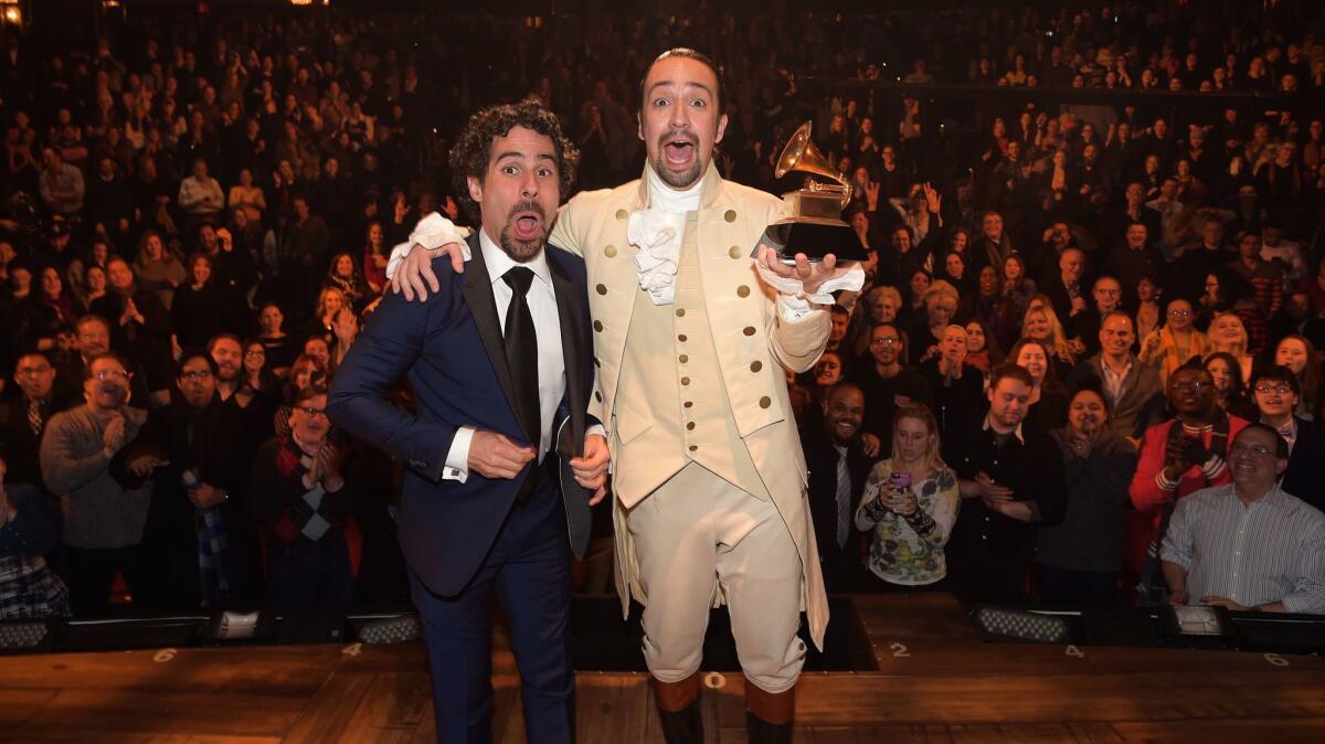 Lacamoire and Lin-Manuel Miranda celebrate on stage at the Richard Rodgers Theatre after performing live on the Grammy Awards and winning for musical theater album.