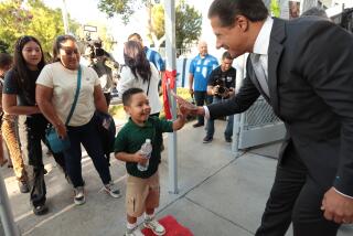 Los Angeles, CA - August 12, 2024: Los Angeles Unified Superintendent Alberto M. Carvalho greets students and families at Main Street Elementary School on the first day of the 2024-25 school year. (Al Seib / For The Times)