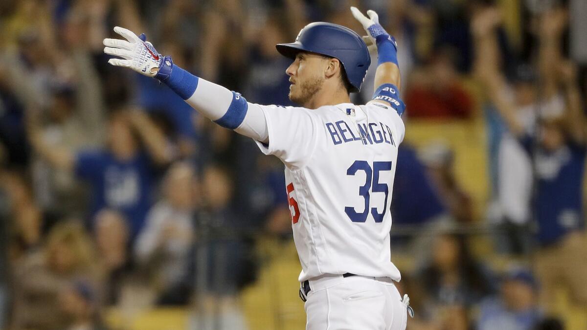 Dodgers right fielder Cody Bellinger hits a a solo home run to power the Dodgers past the Diamondbacks, 5-4, in the 10th inning on Wednesday at Dodger Stadium.