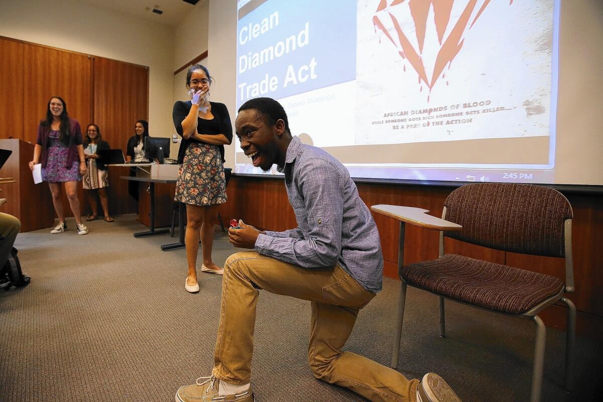 Donald Abram and Brenda Benitez act out a light-hearted skit for their team's presentation on the Clean Diamond Trade Act, which they wrote a Wikipedia entry on for a class assignment at Pomona College.