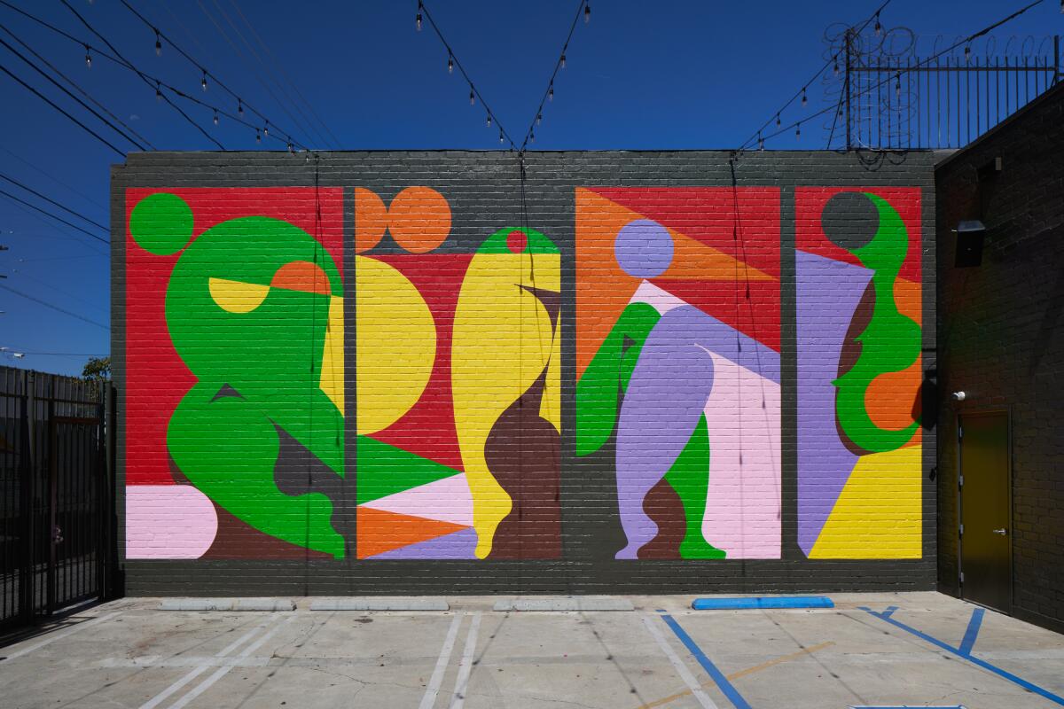A colorful painted mural outside a building