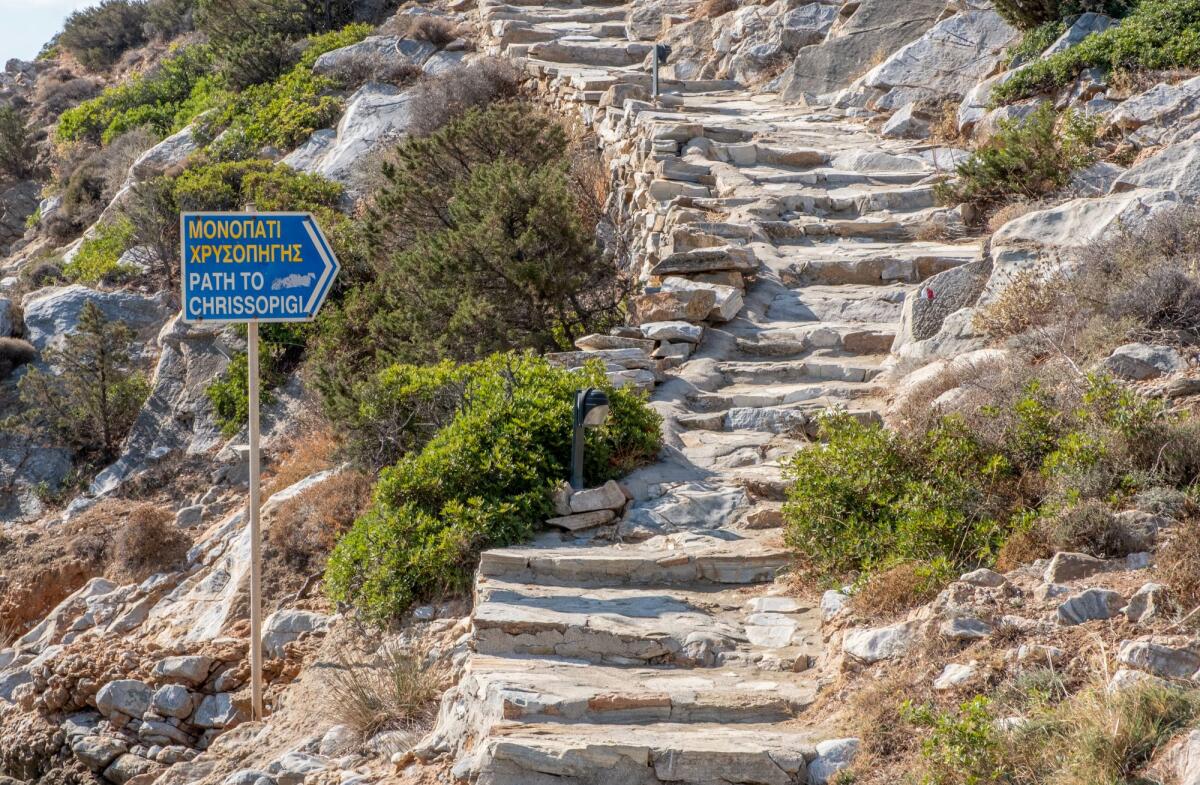 A hiking trail to Chrissopigi Monastry at Faros on Sifnos island in Greece.