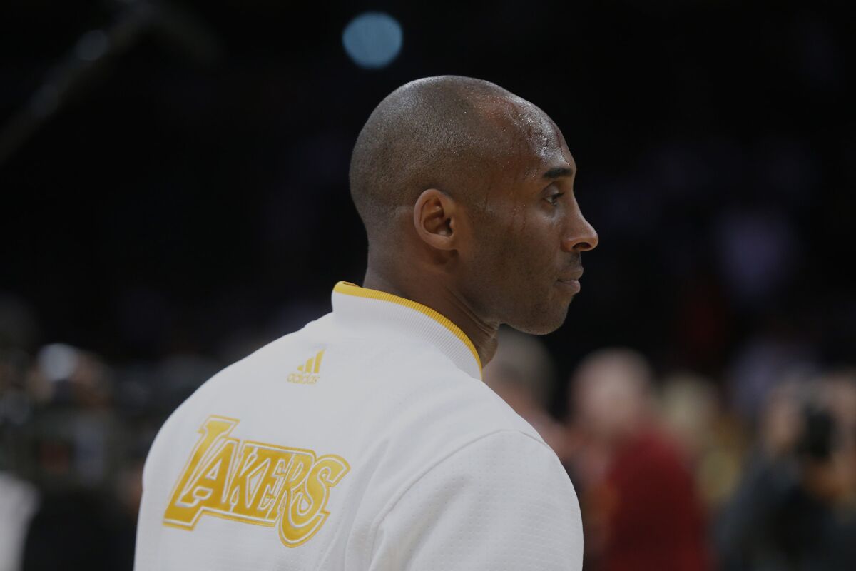 Lakers star Kobe Bryant works up a sweat during pregame warmups agains the Indiana Pacers Sunday night.
