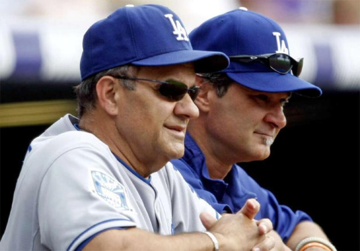 Don Mattingly, right, served as the Dodgers' hitting coach under Joe Torre before taking over as the manager of the team.