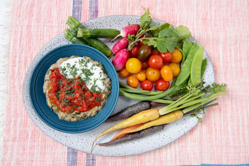 LOS ANGELES, CA-June 6, 2019: Eggplant Dip and Tomato Compote cooked and styled by Genevieve Ko.