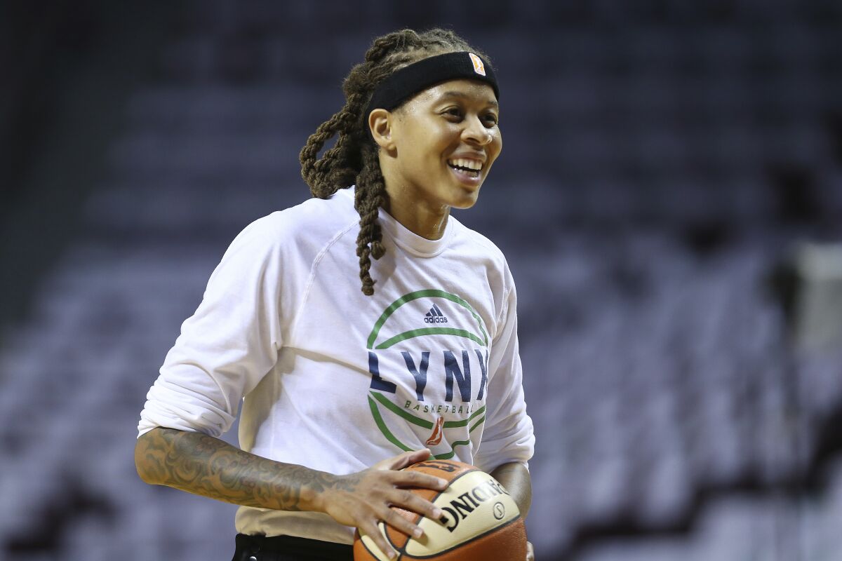 Seimone Augustus on court during pregame warmups in 2017