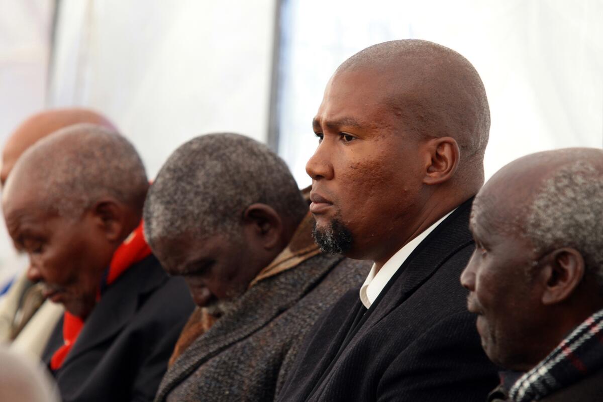 Mandla Mandela, center, grandson of former South African President Nelson Mandela, attends a family funeral earlier this month in the Eastern Cape village of Qunu.