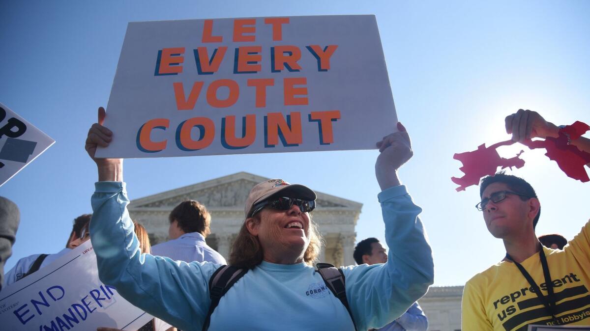 Demonstrators gather in Washington to call for an end to partisan gerrymandering on October 3, 2017.