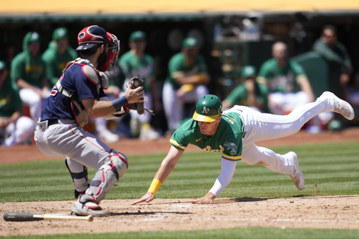 A's hit 3 two-run homers to beat the Red Sox 6-5 - The San Diego