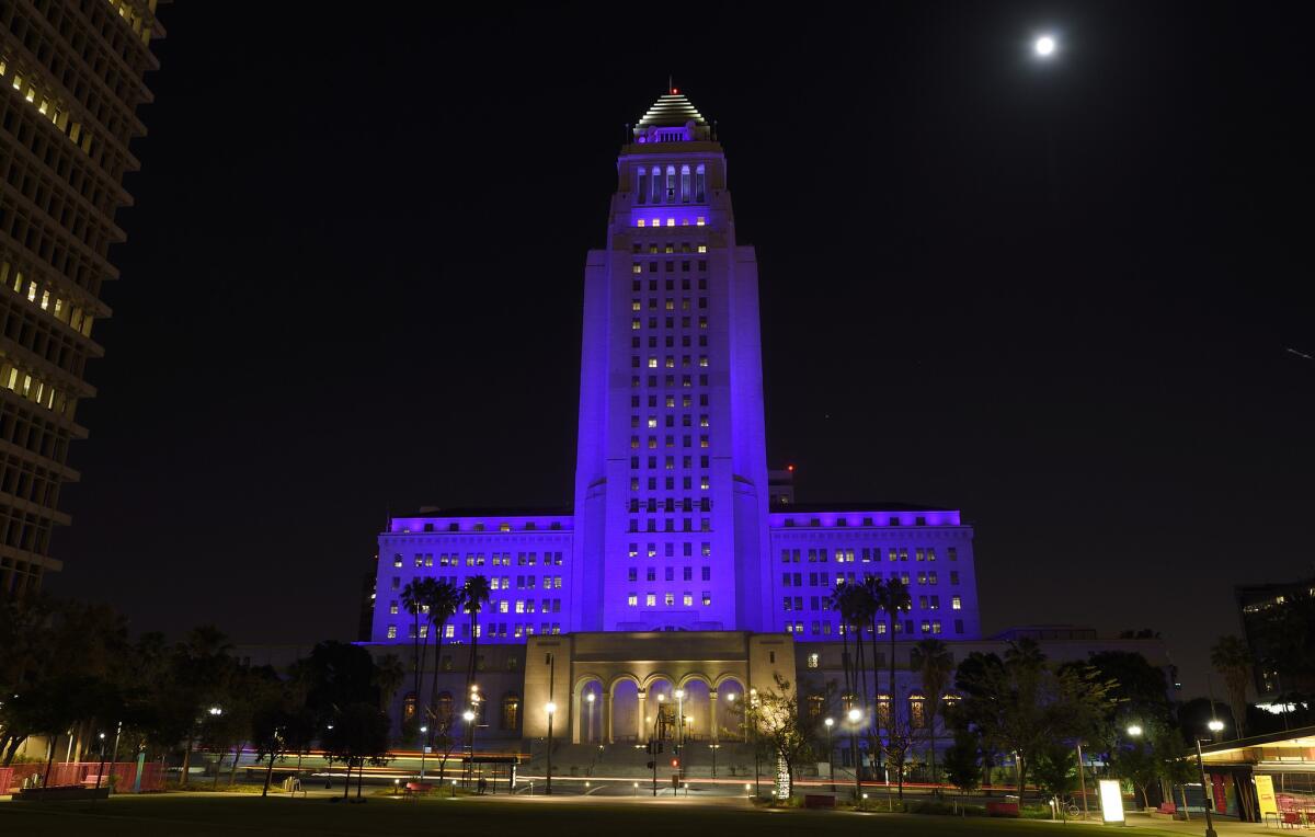 Los Angeles City Hall is lighted in purple on April 23 as a tribute to the late musician Prince.