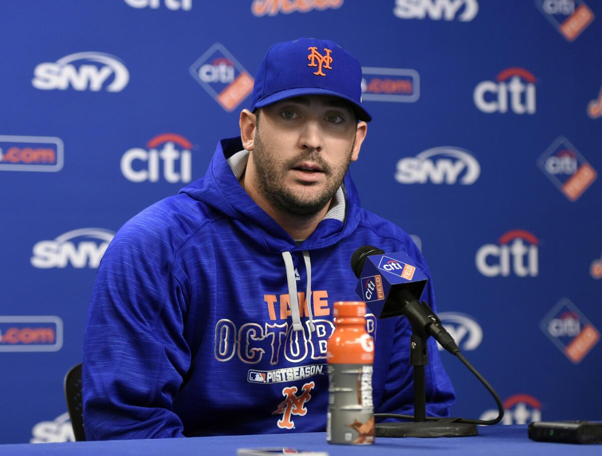 New York Mets pitcher Matt Harvey speaks to the media to explain his absence during a practice at Citi Field on Oct. 6 ahead of the National League division series against the Dodgers.