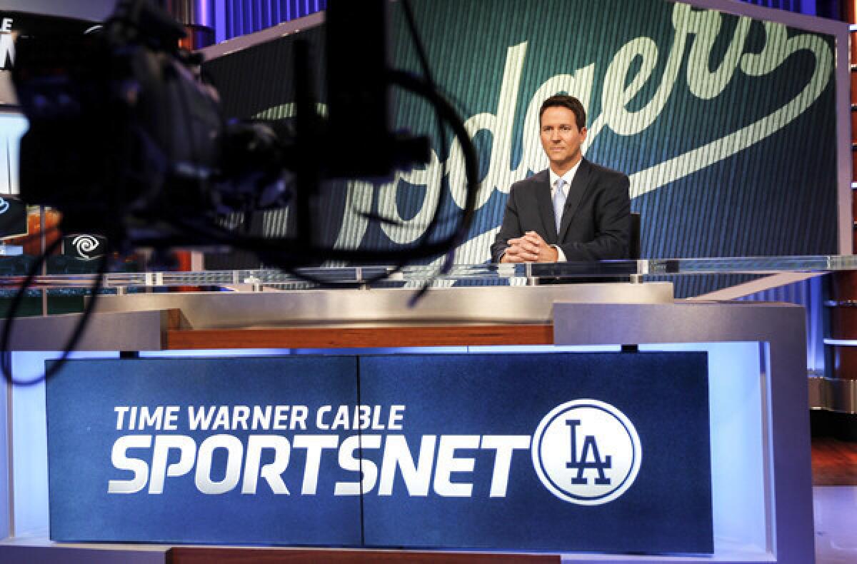 John Hartung, formerly of KABC, is the main studio anchor for SportsNet LA, although a majority of Dodgers fans have yet to see the coverage.