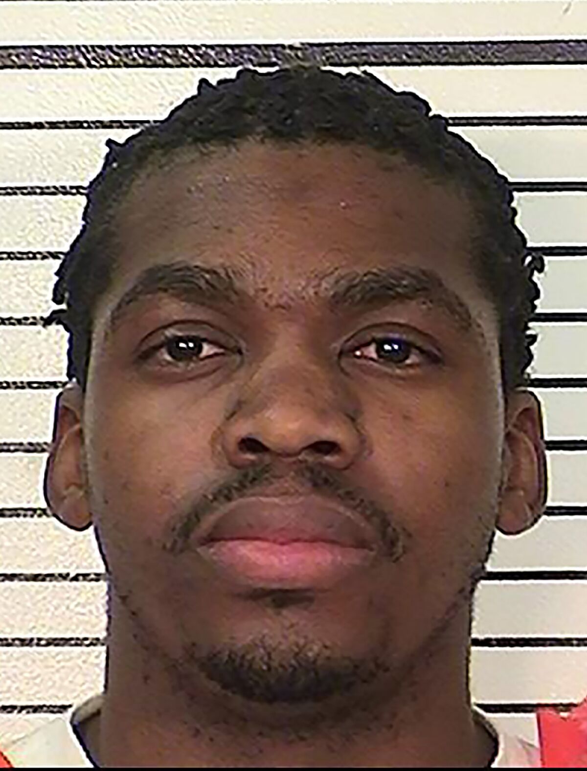 This March 28, 2017 photo provided by the California Department of Corrections and Rehabilitation shows Daryol Richmond. Richmond, is one of two California prison inmates who allegedly ran an unemployment scam that sought to defraud the California Economic Development Department of an estimated $25 million. (California Department of Corrections and Rehabilitation via AP)