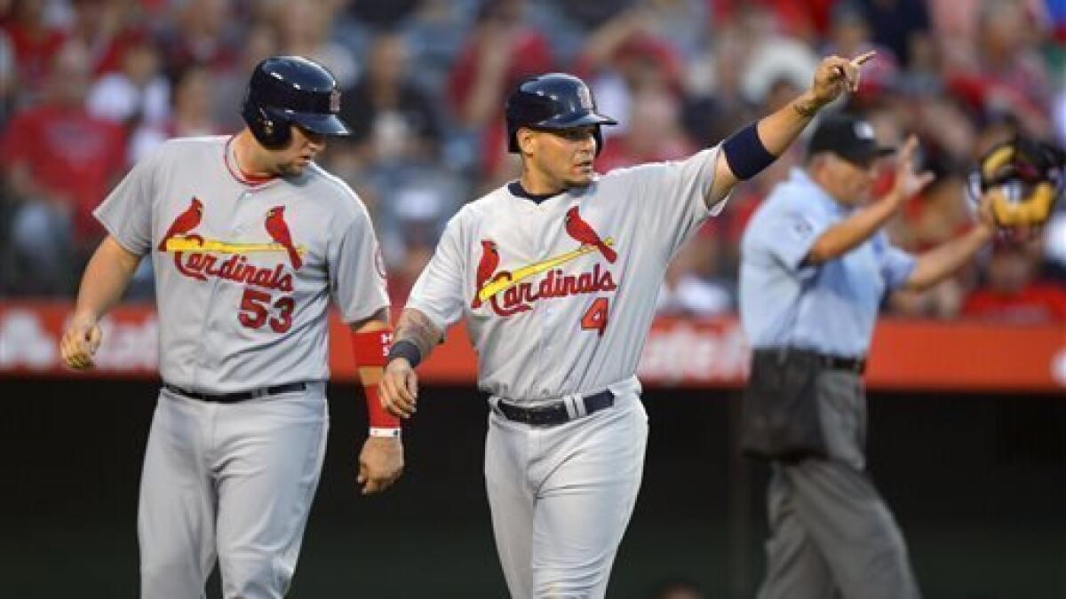 Matt Holliday's slam caps Cardinals' 10th-inning win