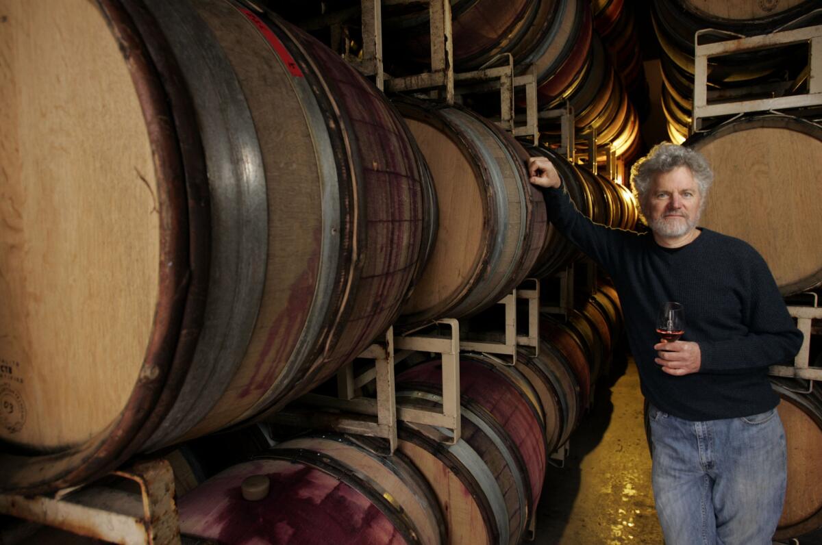 Ojai wine maker Adam Tolmach in his barrel room. On Dec. 4, Ojai Vineyard wines will be poured at a special dinner at Maison Giraud in Pacific Palisades.