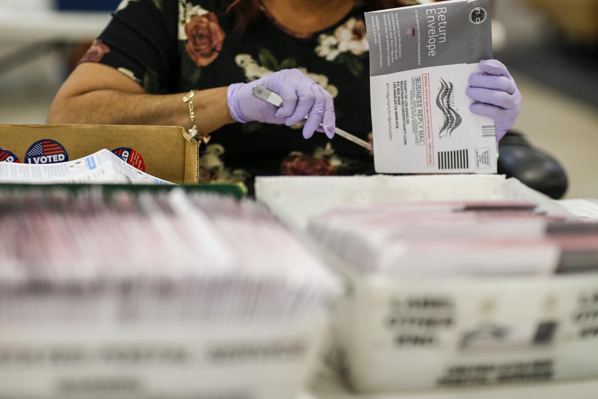 Mail-in ballots being processed at a Los Angeles County facility.
