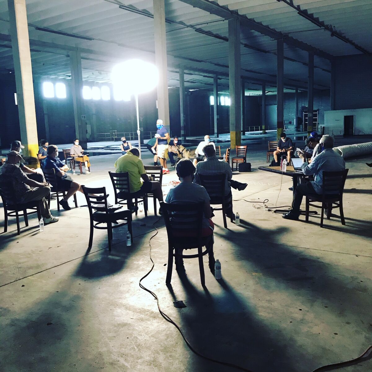 A shot of a production meeting using Covid-19 safety measures on the set of "The Card Counter" in Biloxi, Mississippi