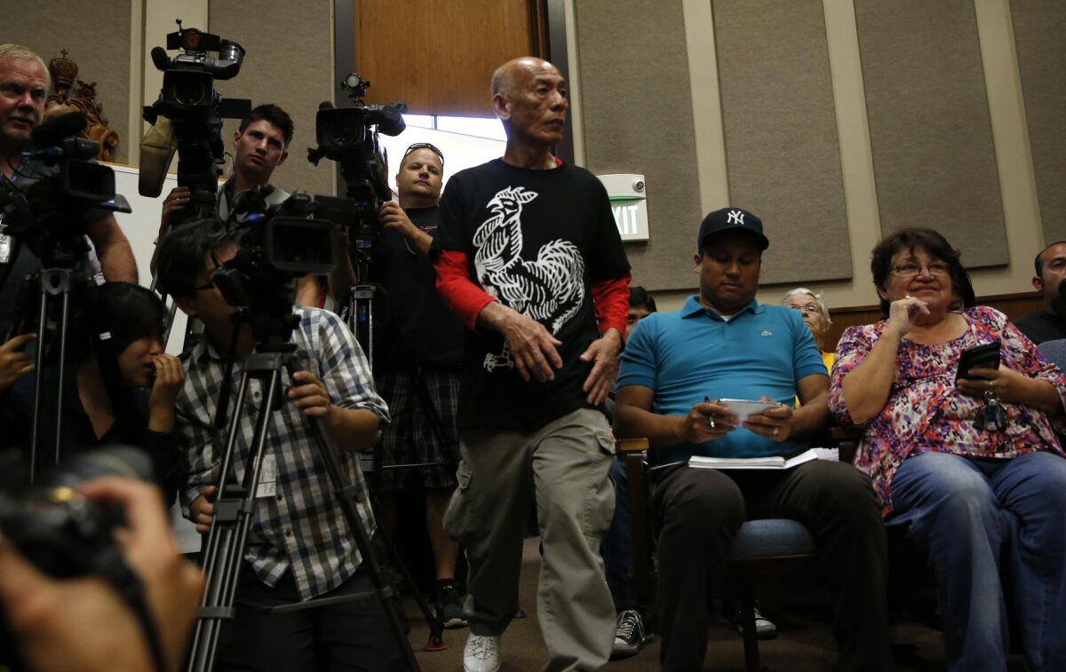 Sriracha plant owner David Tran arrives at the Irwindale city council meeting.