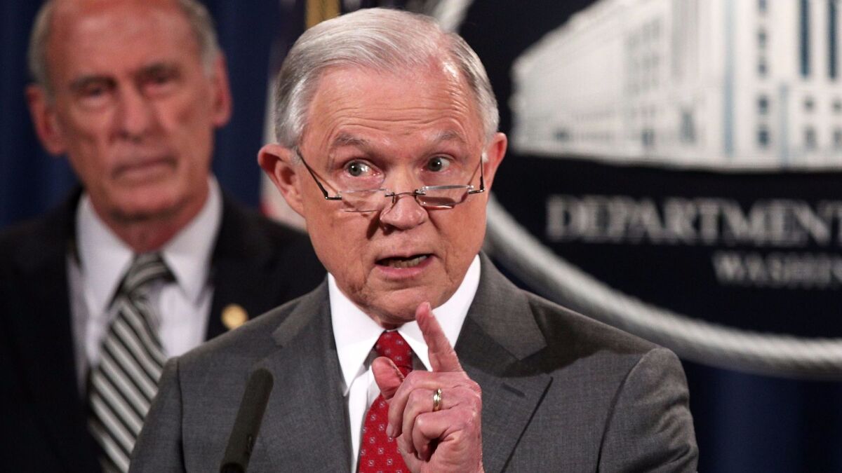 Atty, Gen. Jeff Sessions, shown speaking to reporters, has threatened to cut off funds to so-called sanctuary cities.