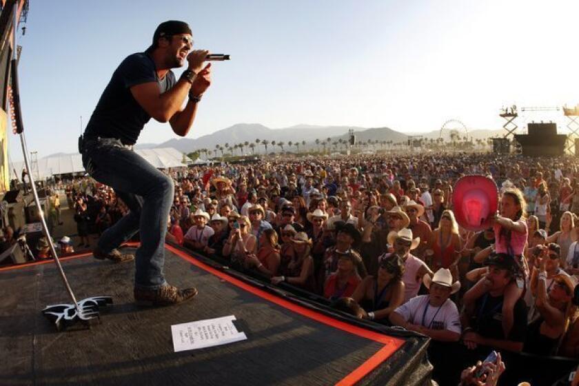 Country singer Luke Bryan, shown performing at the 2012 Stagecoach Country Music Festival in Indio, has now landed two No. 1 albums on the Billboard 200.