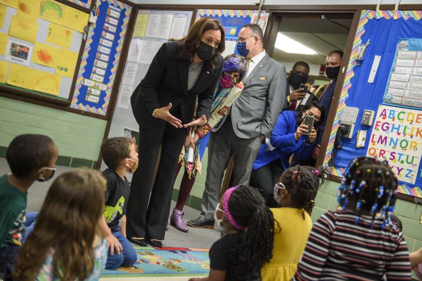 Vice President Kamala Harris, Rep. Rosa DeLauro, D-Conn., and Secretary of Education Miguel Cardona visit with children in a classroom at West Haven Child Development Center in West Haven, Conn., Friday, March 26, 2021. (Mark Mirko/Hartford Courant via AP)