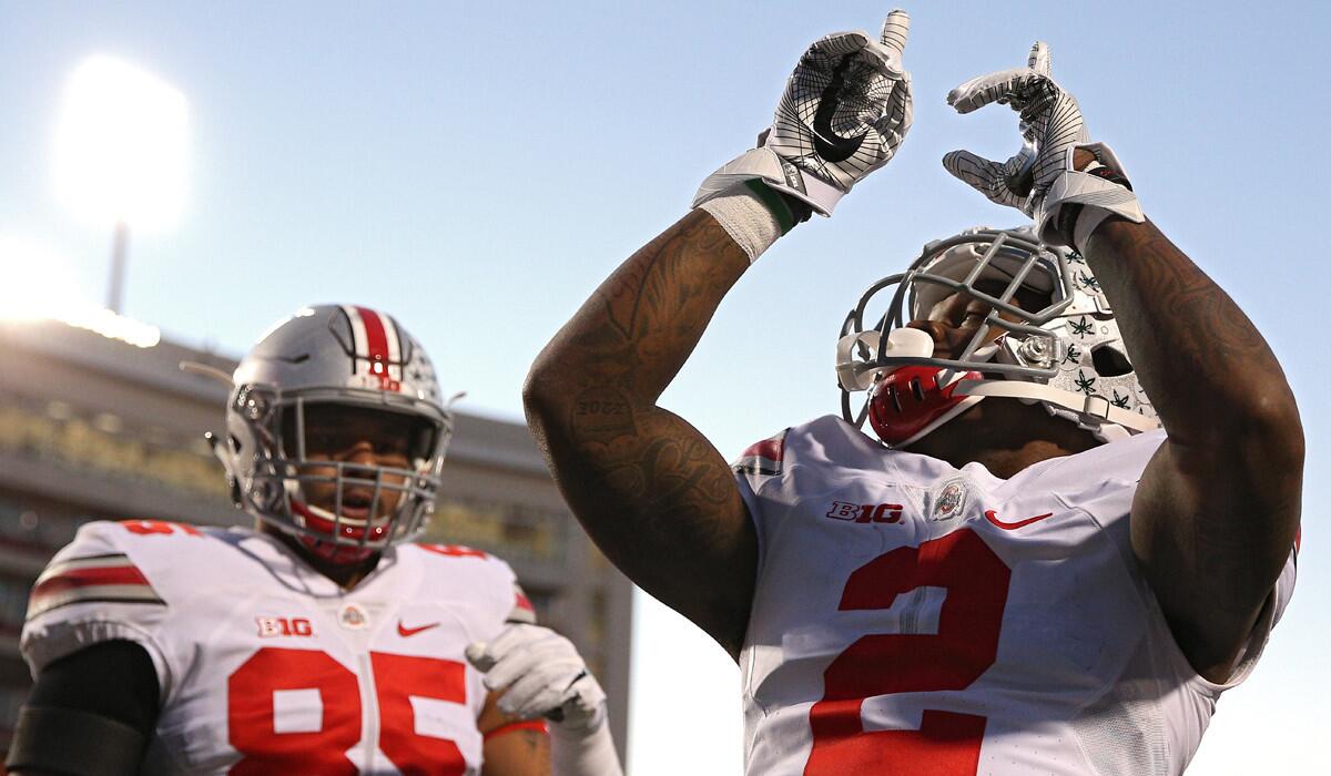 Ohio State's Dontre Wilson (2) celebrates after scoring a touchdown against Maryland during the second quarter on Saturday.