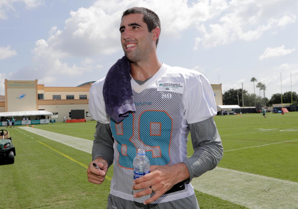 July 2018 photo of then Miami Dolphins tight end Gavin Escobar in Davie, Fla.