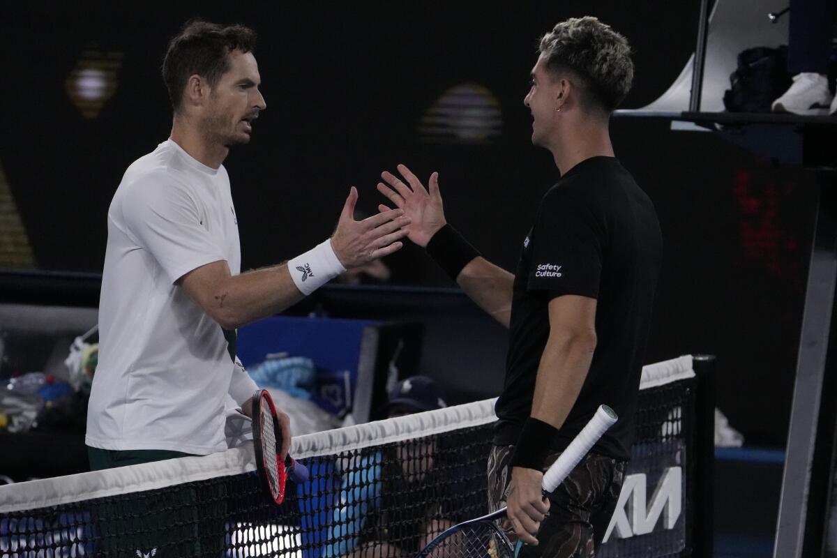 Andy Murray and Thanasi Kokkinakis shake hands after their match ended early Friday morning.