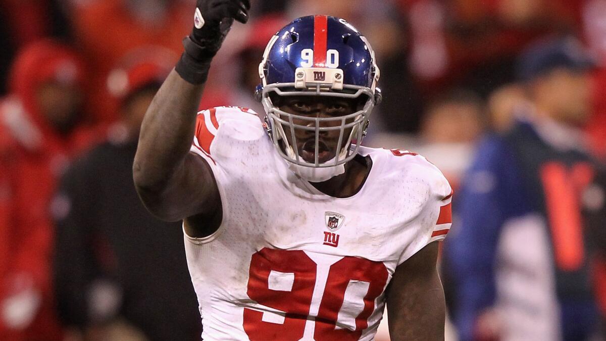 New York Giants defensive end Jason Pierre-Paul celebrates during the NFC Championship game against the San Francisco Giants on Jan. 22, 2012.