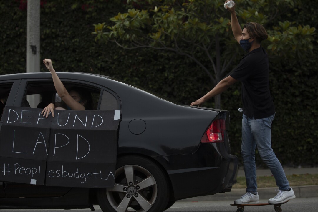 Defund LAPD protest sign