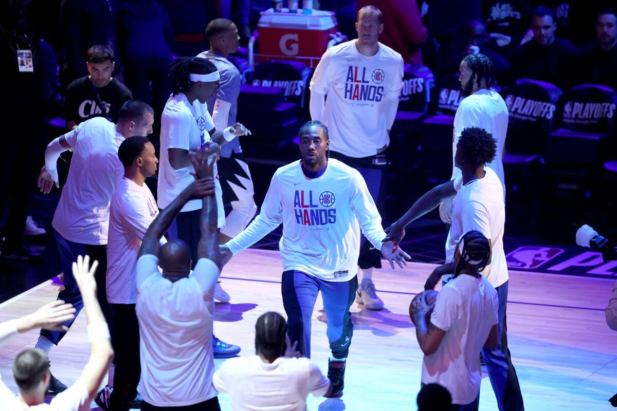 The Clippers' Kawhi Leonard is introduced at the start of Tuesday's game against the Dallas Mavericks at Crypto.com Arena.