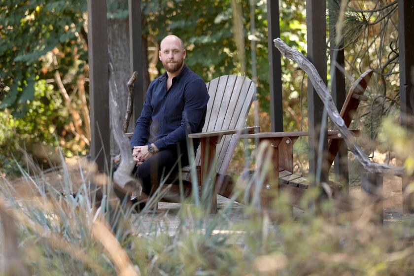 LOS ANGELES, CALIF. -- TUESDAY, SEPTEMBER 3, 2019: Christopher Rountree, 36, who has emerged as one of L.A.'s leaders in the new-music scene, at Descanso Gardens. in Los Angeles, Calif., on Sept. 3, 2019. Rountree's upcoming "Silence" concert series at Descanso Gardens. (Gary Coronado / Los Angeles Times)