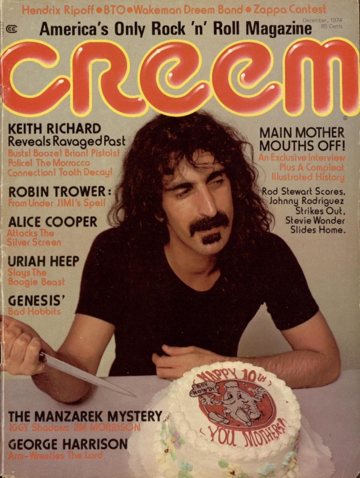 Creem Magazine cover featuring Frank Zappa holding a large knife aimed at a birthday cake