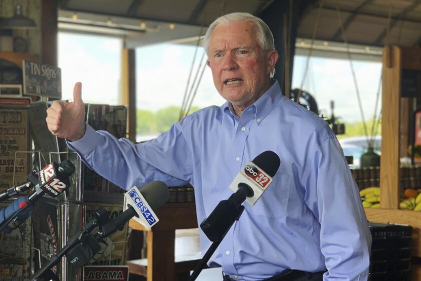 Former U.S. Attorney General Jeff Sessions speaks to reporters during a campaign stop at Sweet Creek restaurant and farmers market, south of Montgomery, Ala., Monday, July 6, 2020. Sessions faces former Auburn University football Coach Tommy Tuberville in the July 14 Republican runoff. Sessions held the seat for 20 years before resigning to become President Donald Trump’s first attorney general. (AP Photo/Kim Chandler)