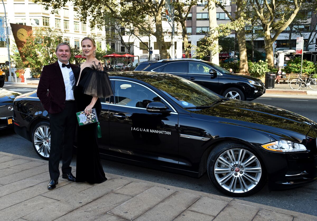 Svitlana Flom and her husband, Gary, pose at the Metropolitan Opera House in New York City on Sept. 26, 2016.