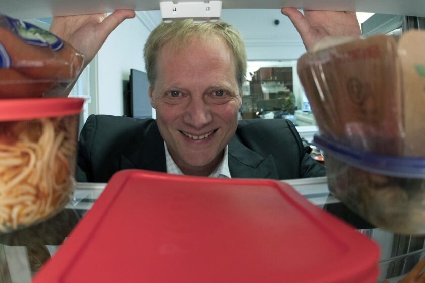 FILE - In this Dec. 6, 2016 file photo, Brian Wansink poses for a photo in a food lab at Cornell University in Ithaca, N.Y. On Thursday, Sept. 20, 2018, the prominent Cornell professor announced hes retiring after a medical journal retracted six of his food research papers. (AP Photo/Mike Groll)