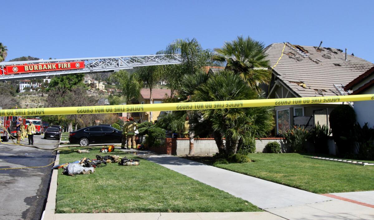 The roof of a two-story Burbank home collapsed Thursday morning after a fire ripped through its attic, causing extensive damage, officials said.