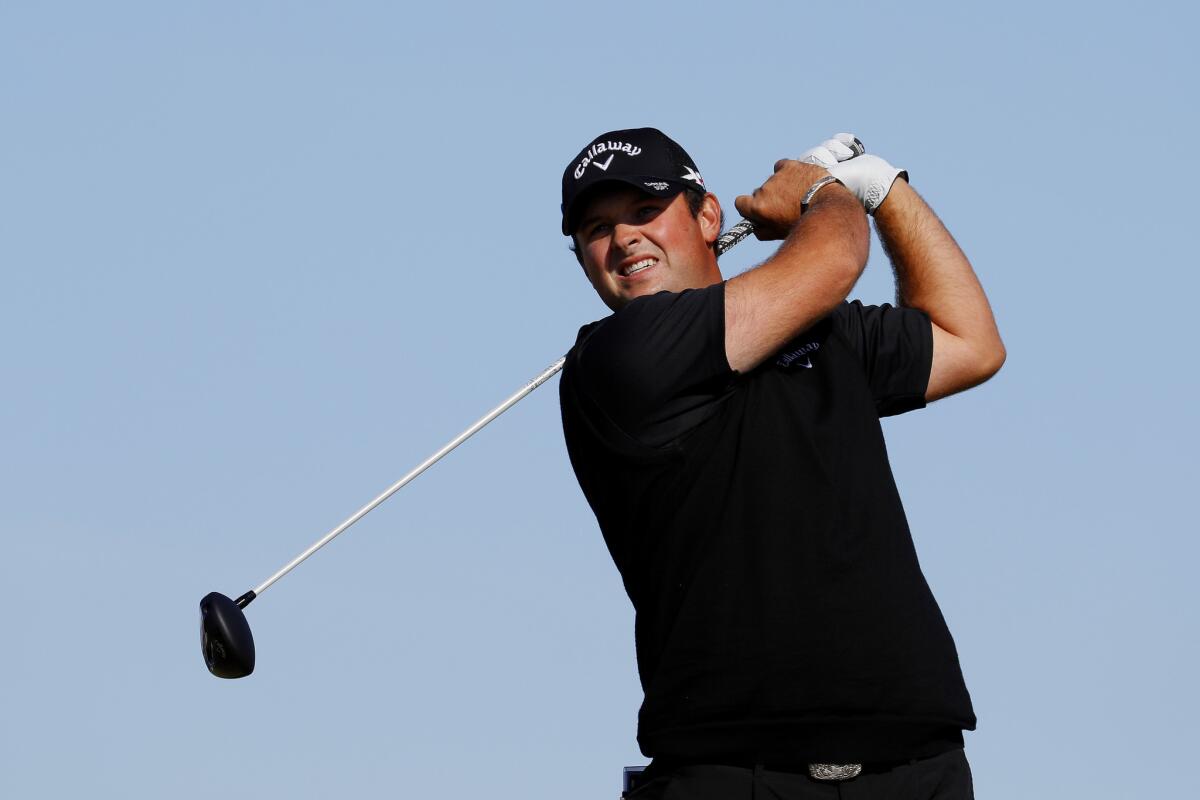 Patrick Reed tees off on the 6th hole during the first round at the British Open on Thursday.