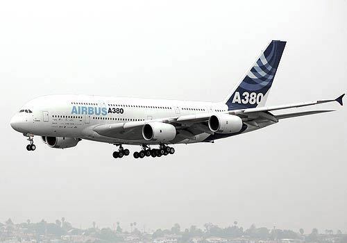 The Airbus A380, the world's largest passenger plane, makes its first-ever descent into Los Angeles.