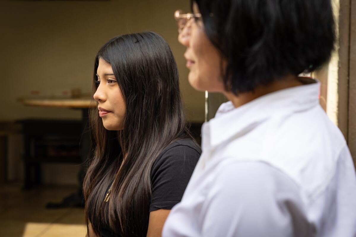 Yaretzi Perez, 14, next to mother Eleuteria Perez