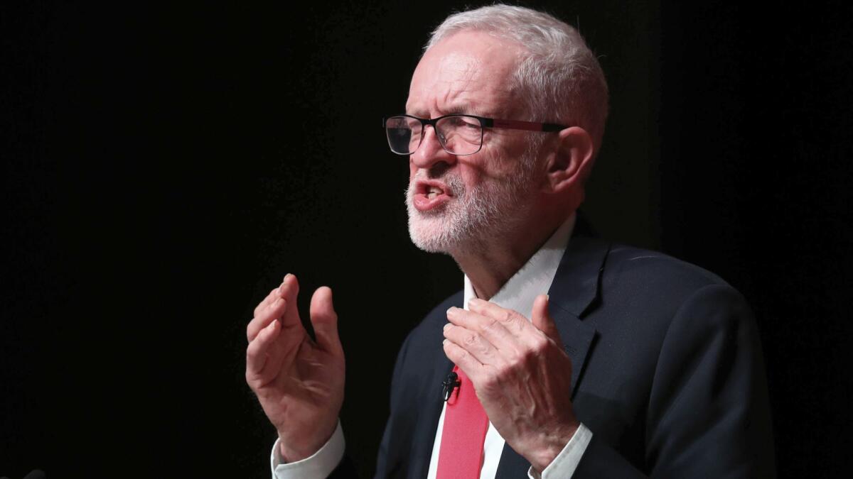 Britain's main opposition Labor Party leader Jeremy Corbyn addressing Scottish Labor's Annual Conference, in Dundee, Scotland, on Friday.