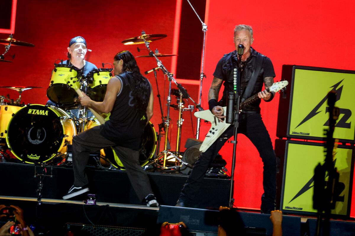 Lars Ulrich, Robert Trujillo and James Hetfield of Metallica perform onstage during the Power Trip music festival