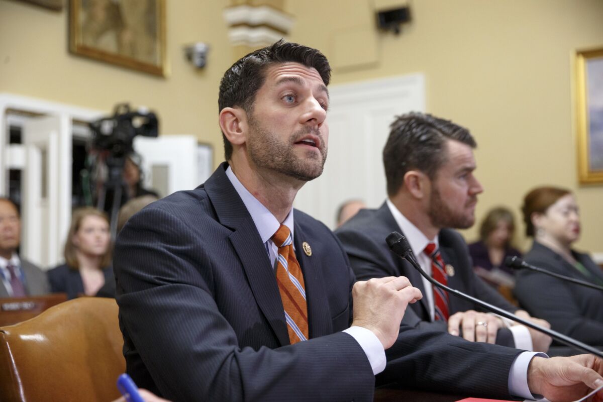 House Ways and Means Committee Chairman Paul Ryan, R-Wis. (foreground): No friend of Obamacare.