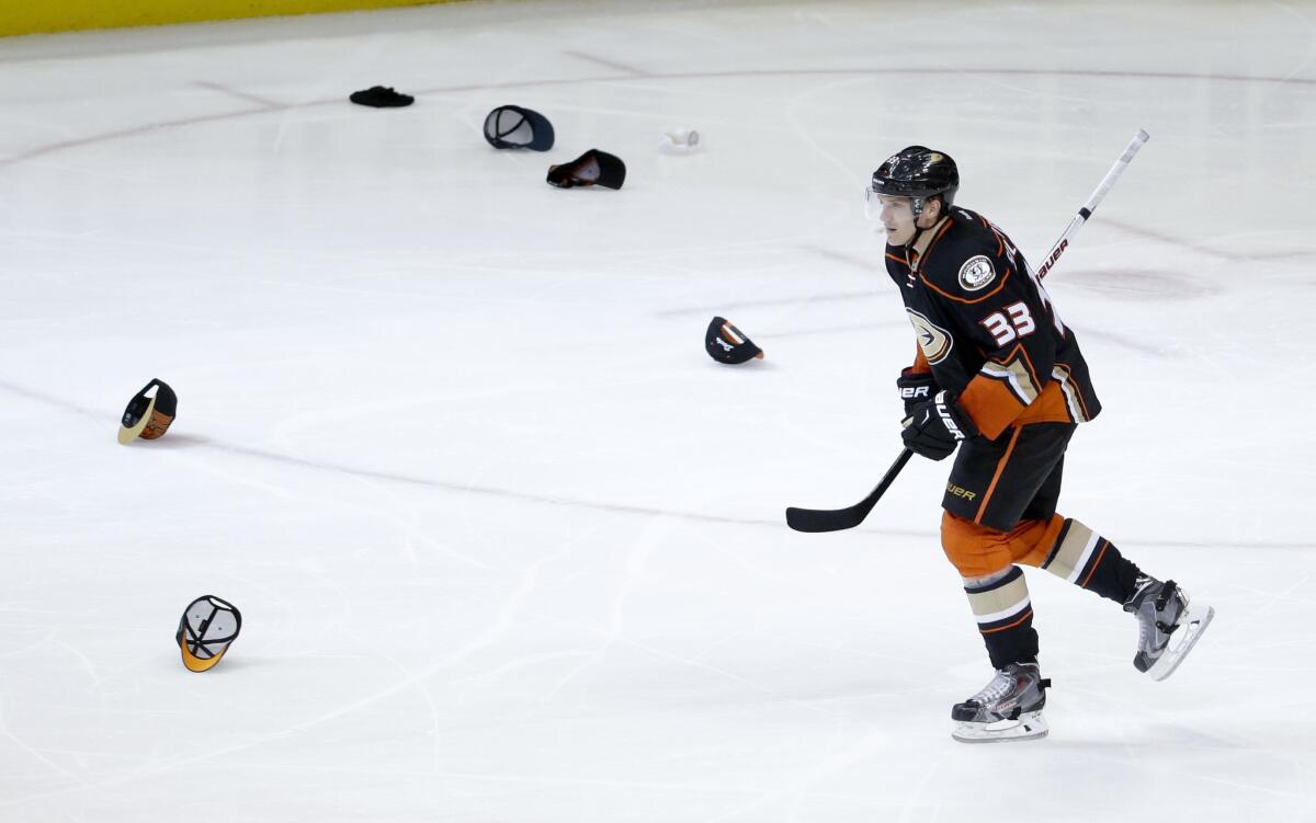 Ducks left wing Jakob Silfverberg celebrates his first career hat trick after his goal in the third period against the New Jersey Devils at Honda Center on March 14.