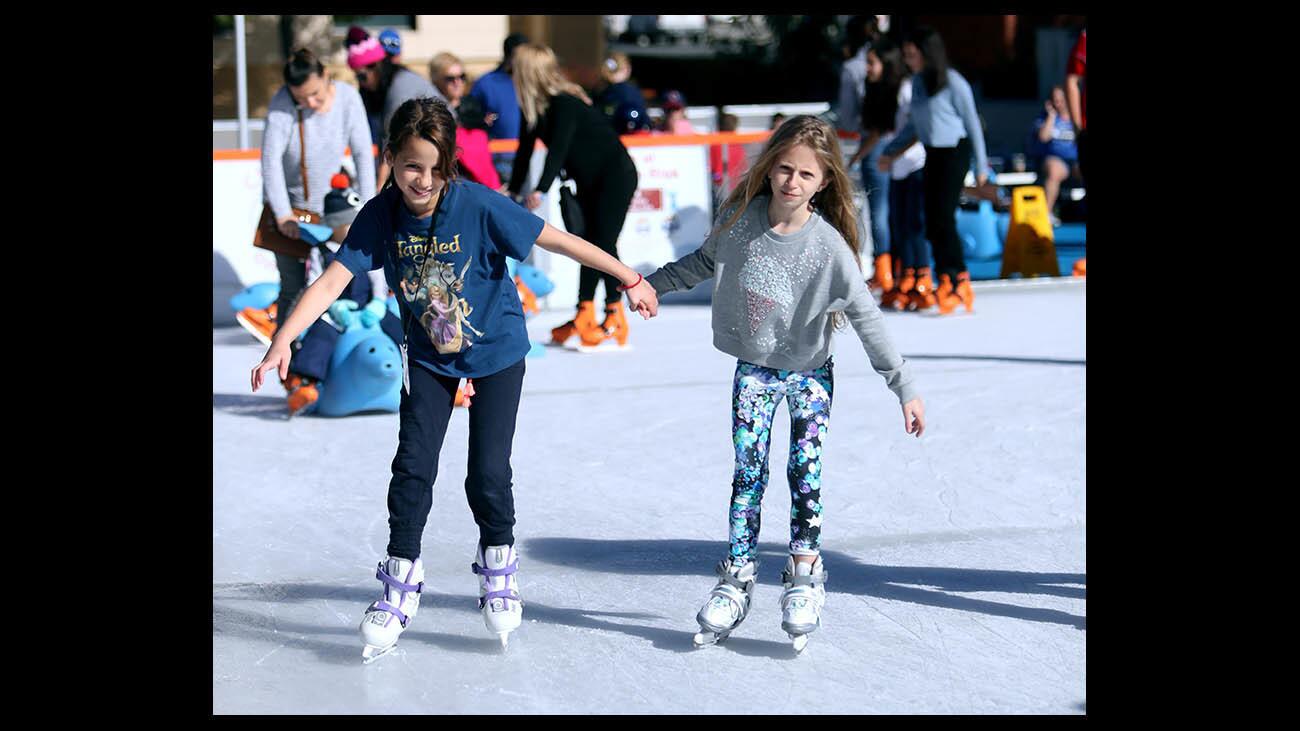 Photo Gallery: Annual Ice America ice skating rink opens to public in Burbank